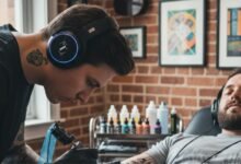 Why tattoo artists listen to music while they tattoo?
